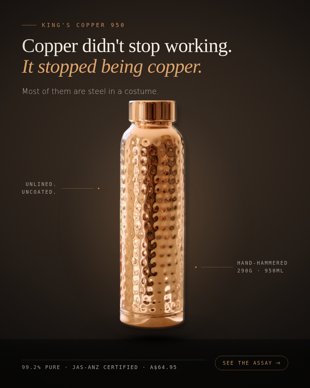 The bottle lit on a pale stage, its colour deepened